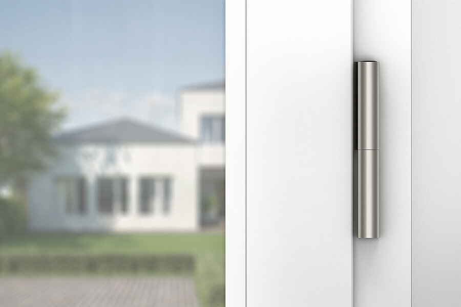 Paumelle cylindrique Roto Solid B 218 P posée sur une porte en PVC
